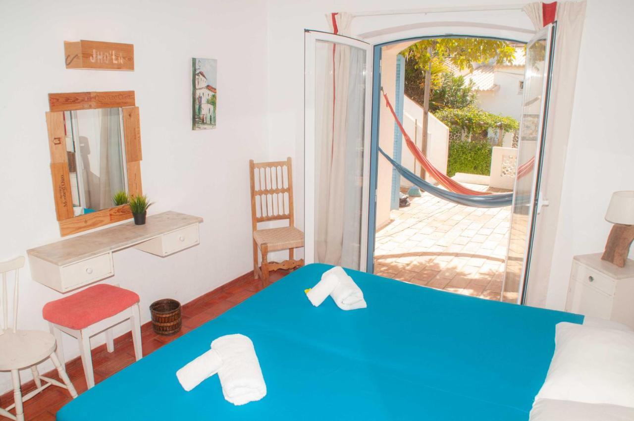 Jho'La Surf Camp Hostel Praia Da Luz Ngoại thất bức ảnh